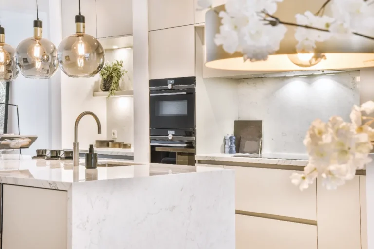 A modern luxury tiled kitchen with great lightings.