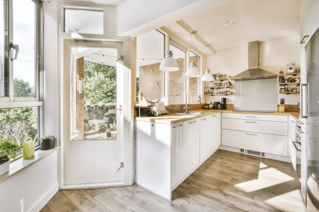 A corner kitchen with white and wood concept.