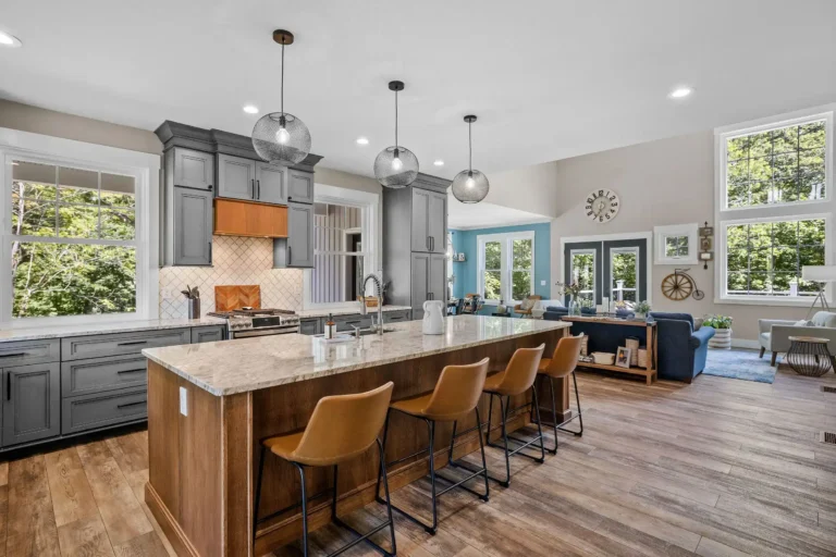 An interior design of a beautiful kitchen with big countertop.